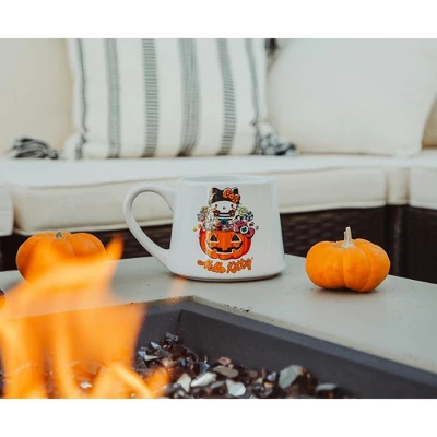 Silver Buffalo Sanrio Hello Kitty Pumpkin Candy Burglar Tapered Pottery Mug | Holds 14 Ounces 7 Silver Buffalo Sanrio Hello Kitty Pumpkin Candy Burglar Tapered Pottery Mug | Holds 14 Ounces - Image 5