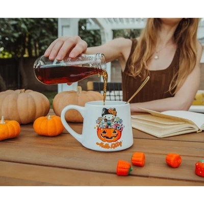 Silver Buffalo Sanrio Hello Kitty Pumpkin Candy Burglar Tapered Pottery Mug | Holds 14 Ounces 5 Silver Buffalo Sanrio Hello Kitty Pumpkin Candy Burglar Tapered Pottery Mug | Holds 14 Ounces - Image 3