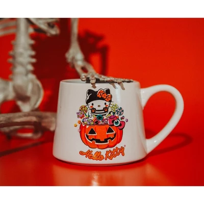 Silver Buffalo Sanrio Hello Kitty Pumpkin Candy Burglar Tapered Pottery Mug | Holds 14 Ounces 8 Silver Buffalo Sanrio Hello Kitty Pumpkin Candy Burglar Tapered Pottery Mug | Holds 14 Ounces - Image 6